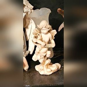 Pair of frosted flower vase cherubs